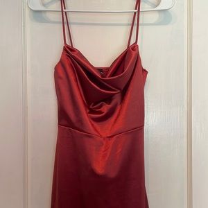 Formal dress with thigh high slit. Worn once for a few hours. Very flattering.